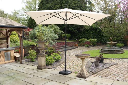 IVORY 2.4mx3m Crank and Tilt Rectangular Parasol, Grey Powder Coated Pole (38mm Pole, 8 Ribs). This parasol is made using Polyester Fabric which has a Weather-Proof Coating & UPF Sun Protection Level 50 | 735339 | 
