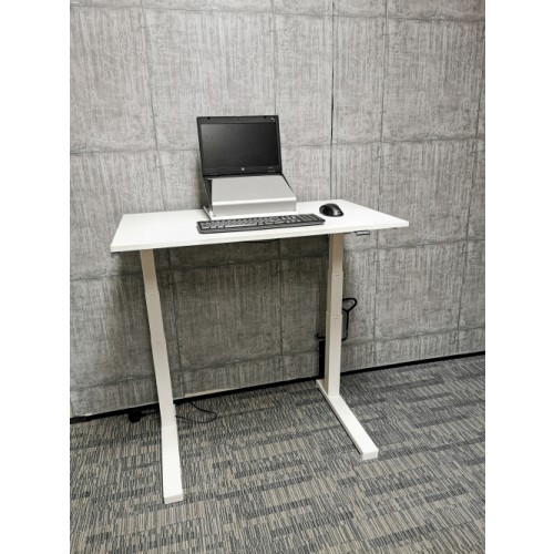 Compact Home Office White Sit Stand Desk. Powered by an electric motor with a built-in digital control panel