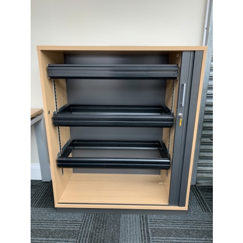 Tambour Cupboard, In Oak Finish, Fitted With Pull-Out Suspension Cradles - 1220mm High x 1000mm Width x 440mm Depth. 2 In Stock