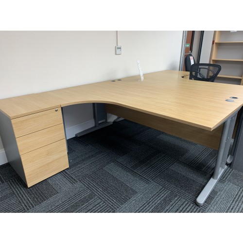 Crescent Desk & Desk High Pedestal, In Limed Oak Finish. 1800mm Width x 1200mm Depth. Lots Of Left & Right-Hands In Stock