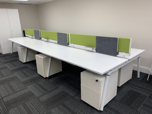 Set Of 6 Herman Miller Sense Bench Desking, With Spider Legs. Each Desk Supplied With; Mobile Pedestal, Desk Top Screen, Cable Trays & Power Modules - Overall Dimensions 4800mm Width x 1600mm Depth - White Finish. 1 Set In Stock