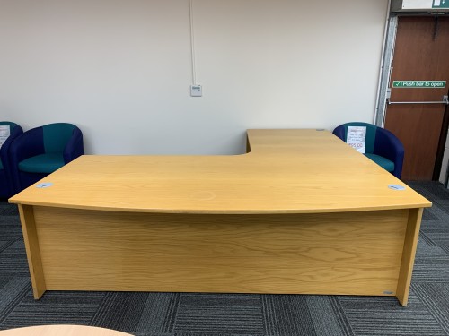 Bow Fronted Executive Desk, With Panel End Legs, In Oak Finish - 2300mm Width x 2290mm Depth. 1 In Stock