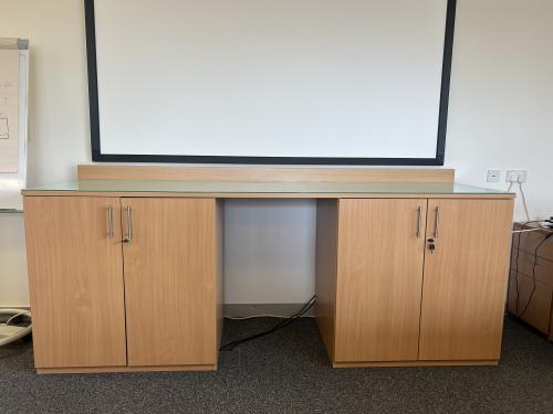 Used Storage Unit, Consisting Of Two Double Door Cupboards & Flyover Top, In Beech Finish - 2560mm Width x 720mm Depth x 1010mm High. 1 In Stock