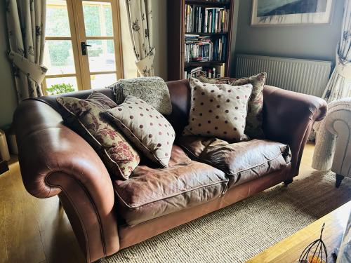 Used Brown Leather Sofa - 2 In Stock
