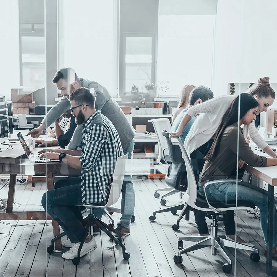 A busy team working in the office with modern office furniture