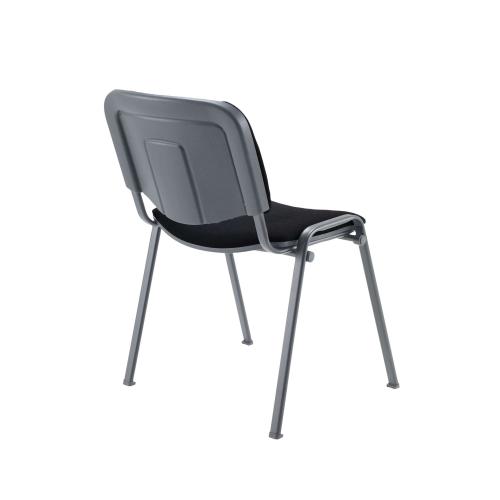 Angle view of the Club Chair featuring cushioned seating, black steel frame, and stackable design.