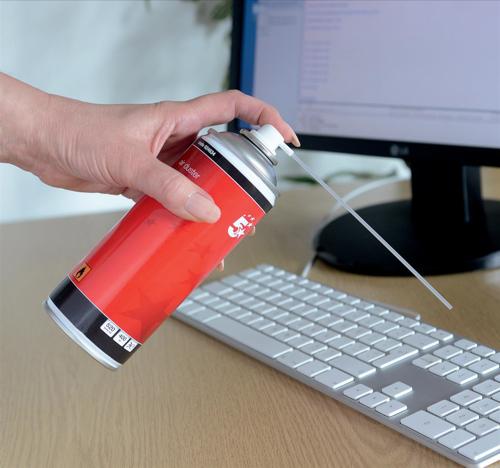 image of keyboard cleaning with a can of spray duster