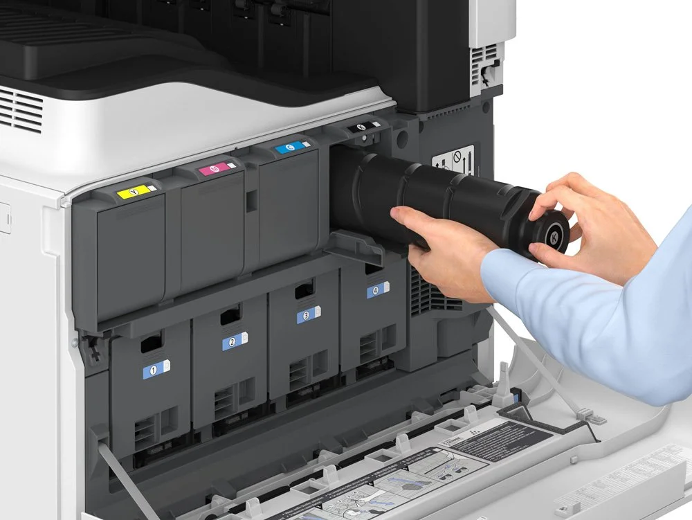 Toner being replaced in a printer