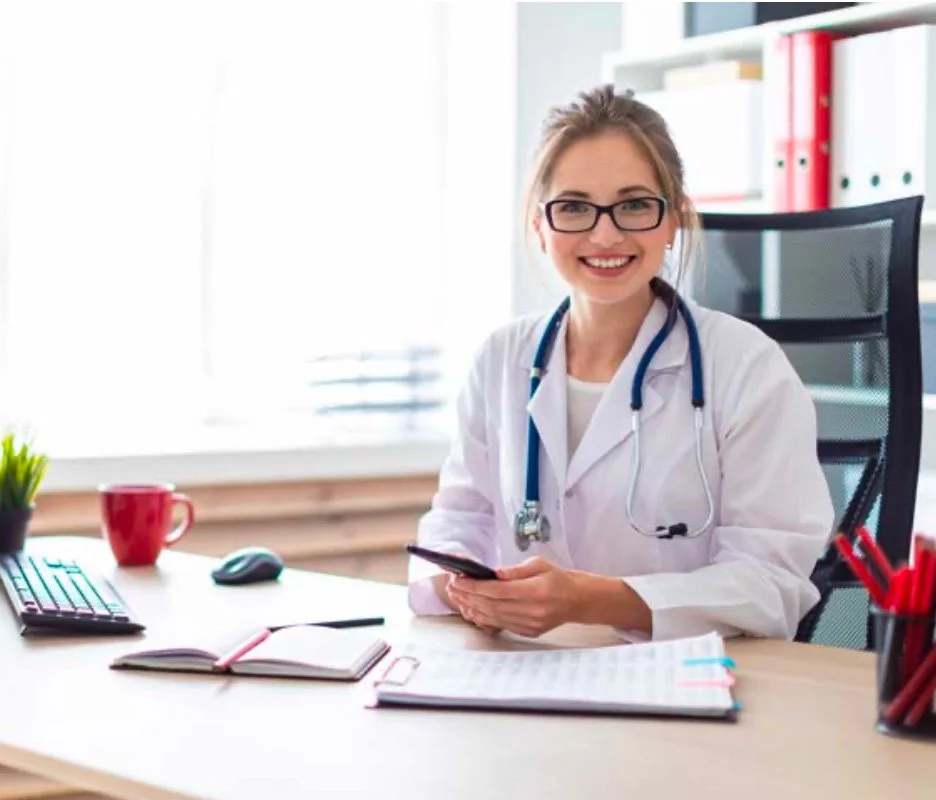 NHS worker at their desk