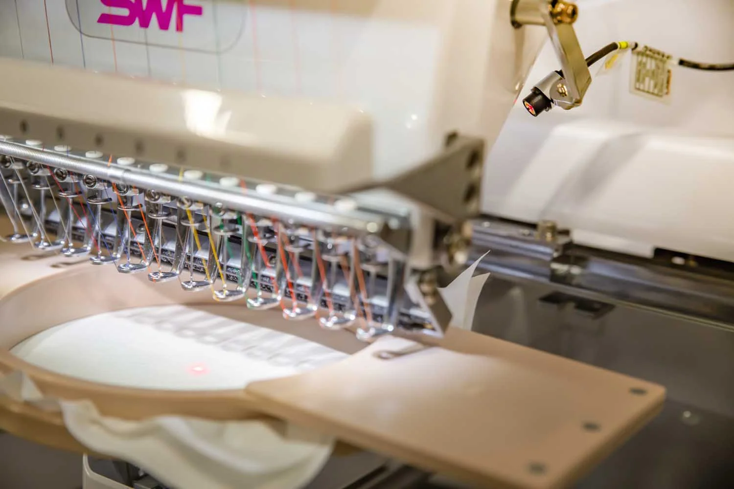 Custom embroidered branding on work uniforms